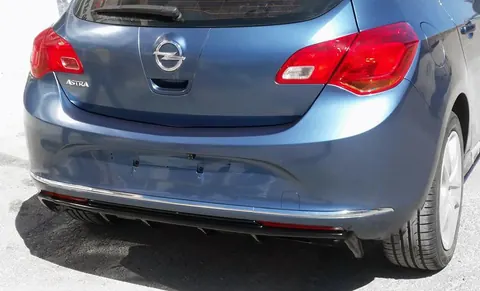 Накладка на задній дифузор (під фарбування) для Opel Astra J 2009-2015 рр — Opel Astra J 2009-2015 гг. DianaParts