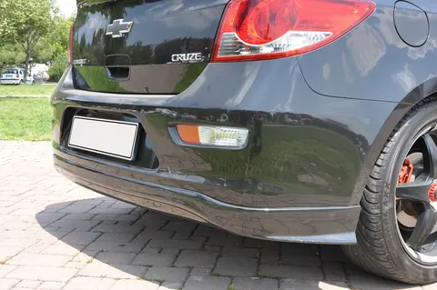 Накладка на задній бампер HB (Meliset, під фарбування) для Chevrolet Cruze 2009-2015 рр — Chevrolet Cruze 2009–2015 гг. DianaParts