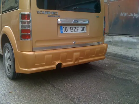 Задній бампер (накладка, під фарбування) для Ford Connect 2006-2009 рр — Ford Connect 2006–2009 гг. DianaParts