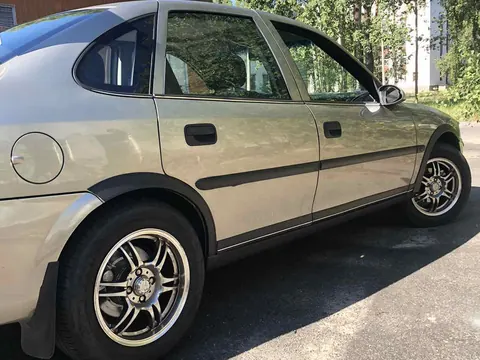 Накладки на арки (4 шт, чорні) металеві для Opel Vectra B 1995-2002 рр — Opel Vectra B 1995-2002 гг. DianaParts