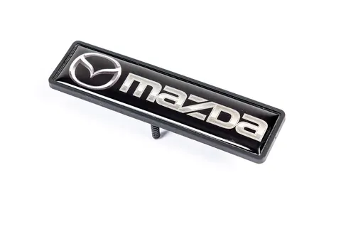 Шильдик для килимків (1шт) для Mazda — Mazda DianaParts