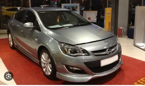 Передня нижня накладка 2012-2015 (під фарбування) для Opel Astra J рр — Opel Astra J 2009-2015 гг. DianaParts