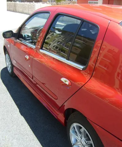 Бокові пороги Ferrari-type (під фарбування) для Renault Symbol 1999-2008 рр — Renault Symbol 1999-2008 гг. DianaParts