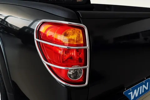 Захист задніх фонарів (нержавійка, 2 шт) для Mitsubishi L200 2006-2015 рр — Mitsubishi L200 2006-2015 гг. DianaParts