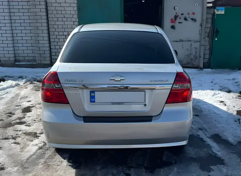 Накладка на задній бампер з загином Пластик Матова, Седан - 4 дверний для Chevrolet Aveo T250 2005-2011 рр — Chevrolet Aveo T250 2005-2011 гг. DianaParts