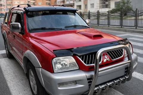 Дефлектор капота (EuroCap) для Mitsubishi L200 1996-2006 рр — Mitsubishi L200 1996-2006 гг. DianaParts