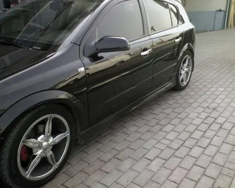 Бічні спідниці HB (під фарбування) для Opel Astra H 2004-2013 рр — Opel Astra H 2004-2013 гг. DianaParts