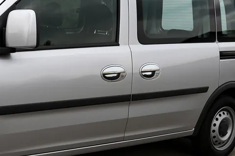 Накладки на ручки з обведенням (2 двер., нерж.) для Opel Combo 2002-2012 рр — Opel Combo 2002–2012 гг. DianaParts