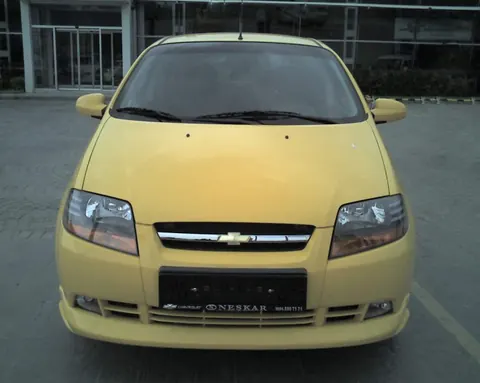 Накладка на передній бампер (під фарбування) для Chevrolet Aveo T200 2002-2008 рр — Chevrolet Aveo T200 2002-2008 гг. DianaParts