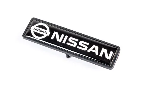 Шильдик для килимків (1шт) для Nissan — Nissan DianaParts