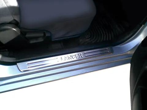 Накладки на пороги OmsaLine (4 шт, нерж) для Mitsubishi Lancer 9 2004-2008 рр — Mitsubishi Lancer 9 2004-2008 гг. DianaParts