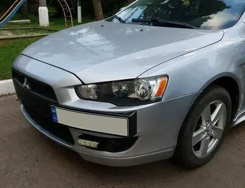 Підставка під номер (пластик) Чорний мат для Mitsubishi Lancer X 2008- рр — Mitsubishi Lancer X 2008- гг. DianaParts
